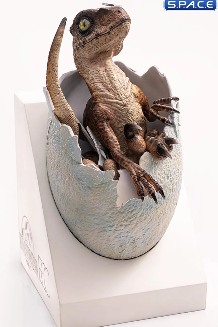 Velociraptor Egg Hatching Statue